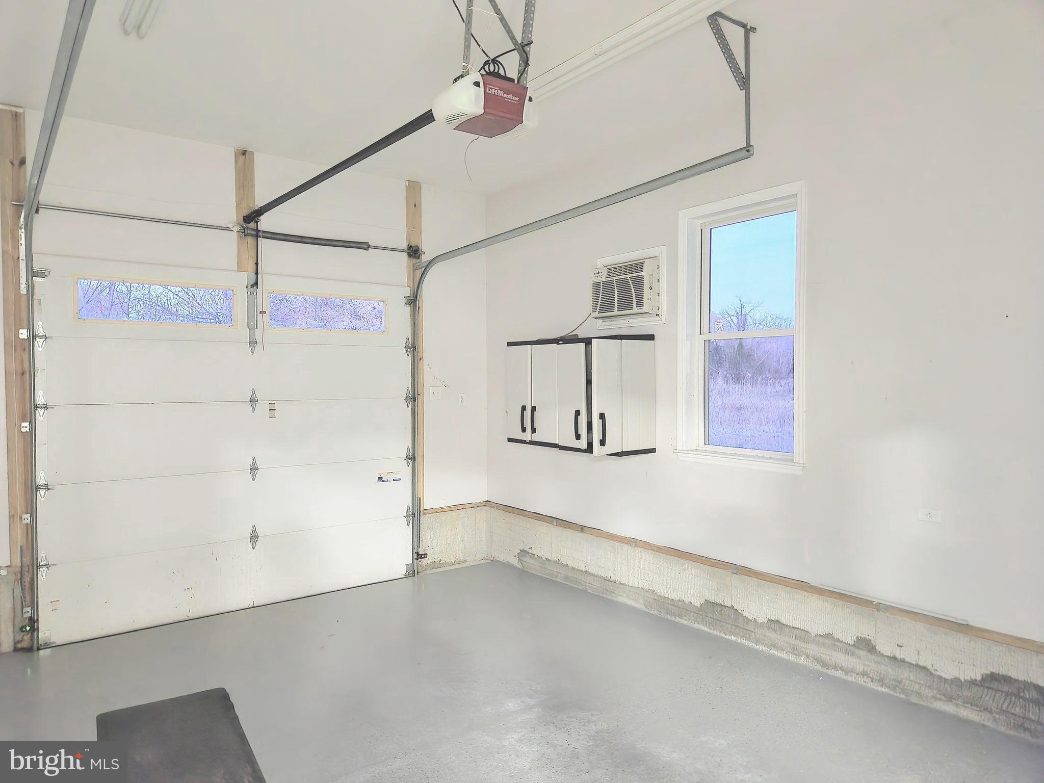 1325 East Riverside Avenue Baltimore, MD 21221 - Photo 51 of 62 Storage Room with Garage Door to Rear Yard