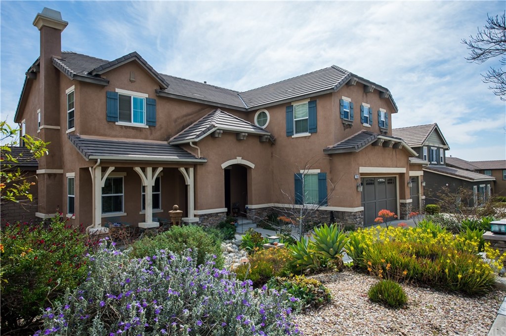 5543 Stoneview Road Rancho Cucamonga, CA 91739 - Photo 1 of 1 front view of a house with a small yard