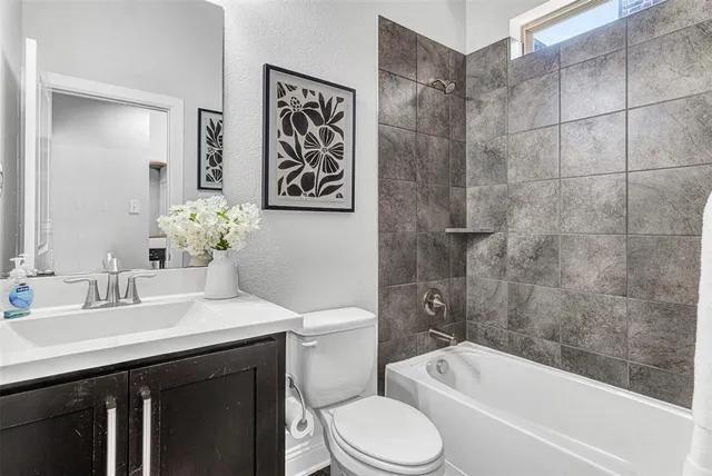 a utility room with closet dryer and washer
