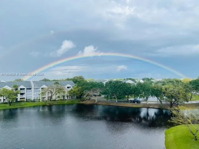 a view of a lake with a city