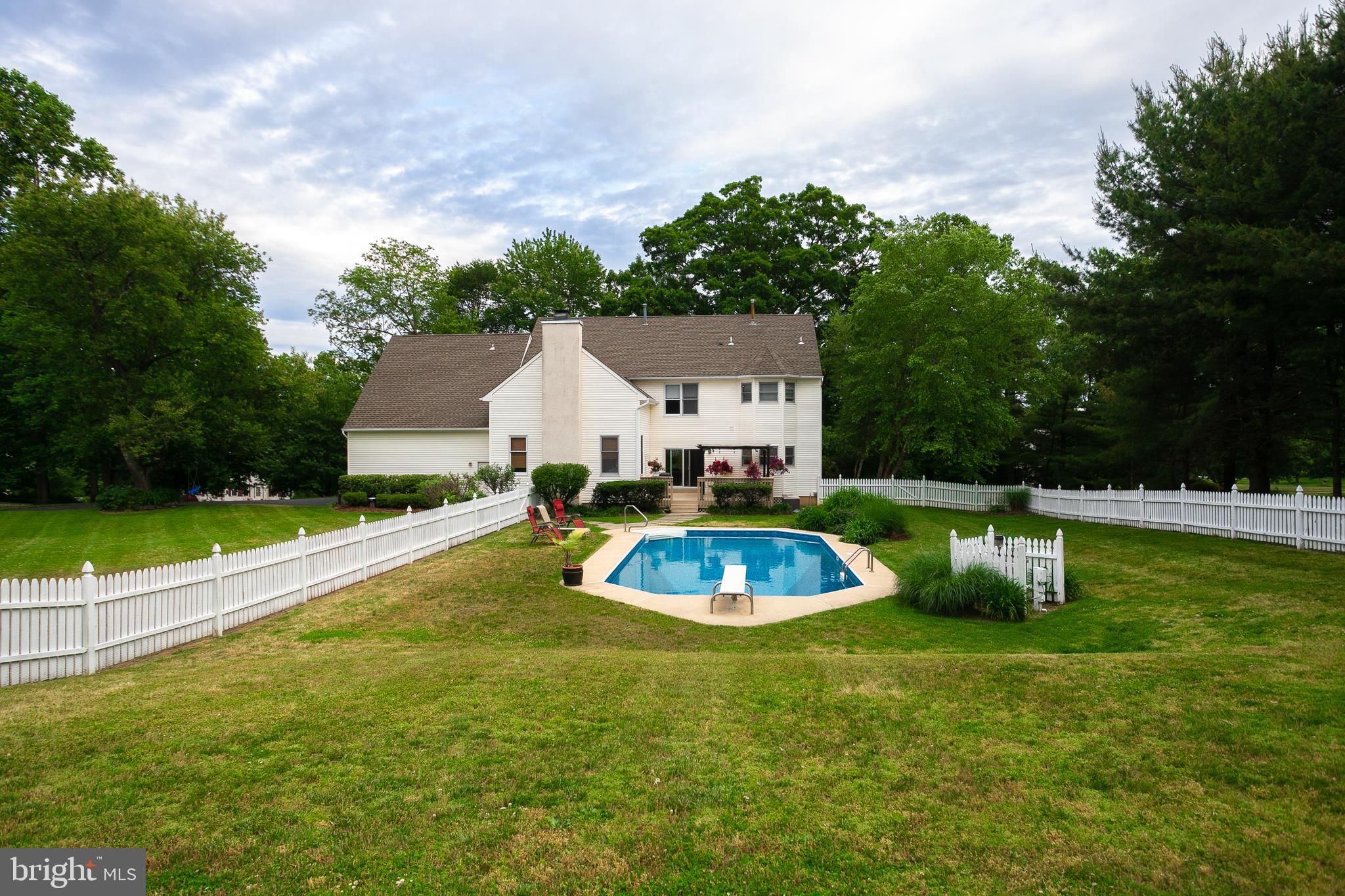 215 Yorkshire Terrace Wrightstown, NJ 08562 - Photo 2 of 43 a view of an house with swimming pool and yard