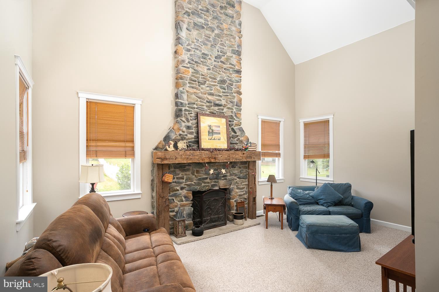 215 Yorkshire Terrace Wrightstown, NJ 08562 - Photo 13 of 43 a living room with furniture a window and a fireplace