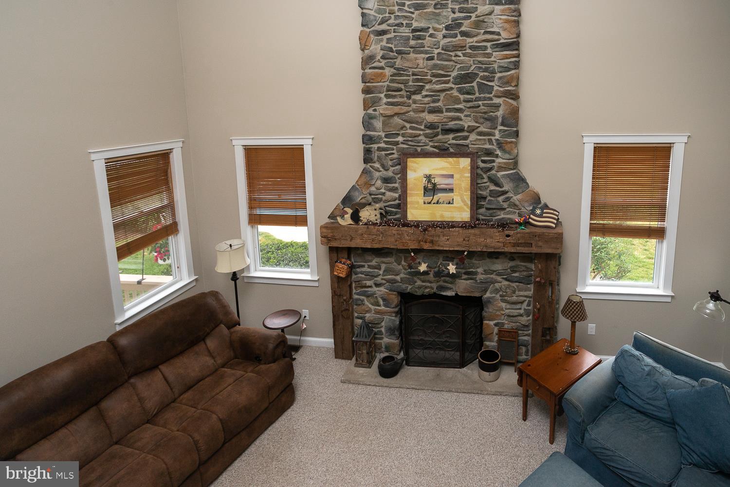 215 Yorkshire Terrace Wrightstown, NJ 08562 - Photo 15 of 43 a living room with furniture and a fireplace