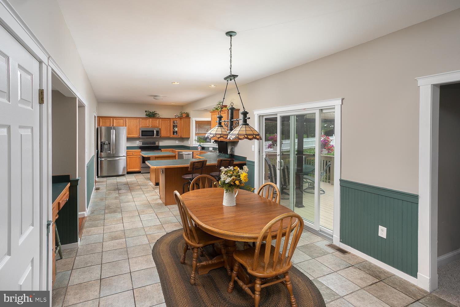 215 Yorkshire Terrace Wrightstown, NJ 08562 - Photo 16 of 43 a dining room with furniture and a chandelier