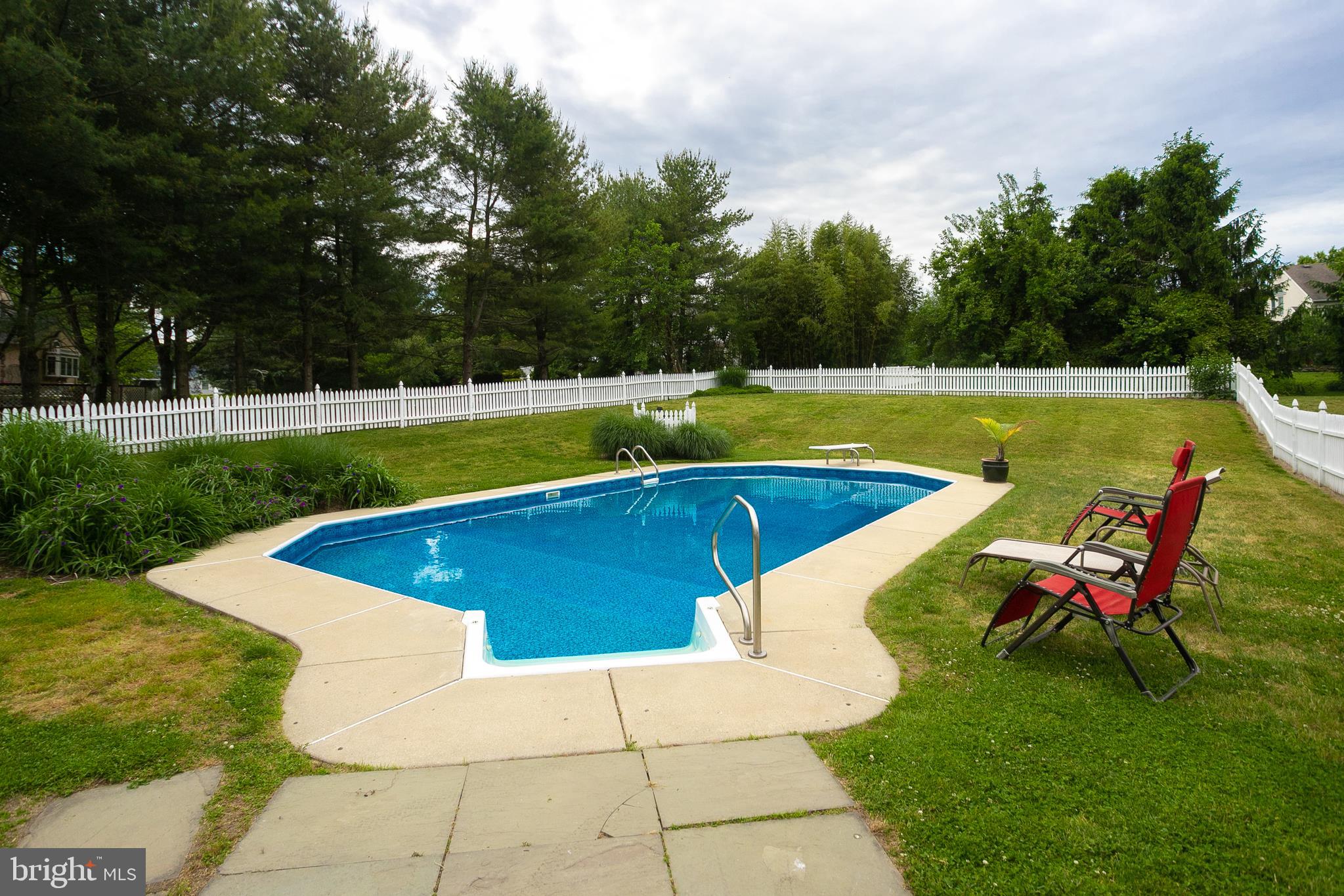 215 Yorkshire Terrace Wrightstown, NJ 08562 - Photo 3 of 43 a view of a swimming pool with a yard