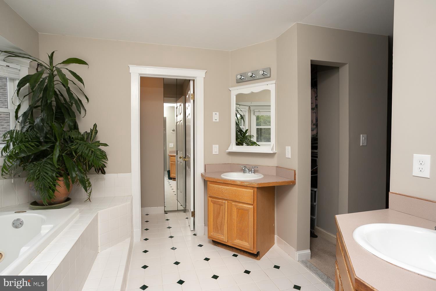 215 Yorkshire Terrace Wrightstown, NJ 08562 - Photo 25 of 43 a bathroom with a sink a toilet and shower