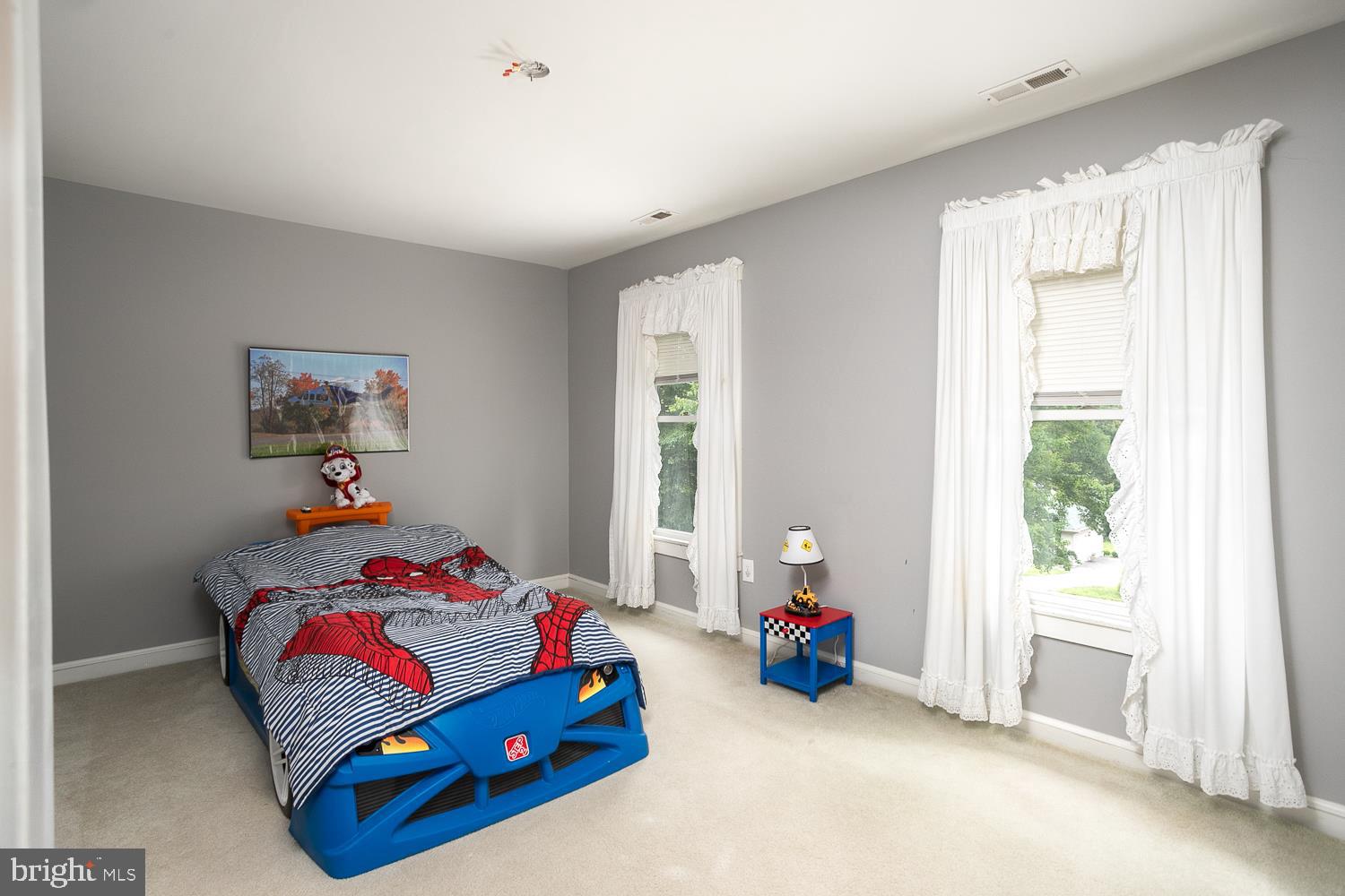 215 Yorkshire Terrace Wrightstown, NJ 08562 - Photo 26 of 43 a bedroom with bed and a window