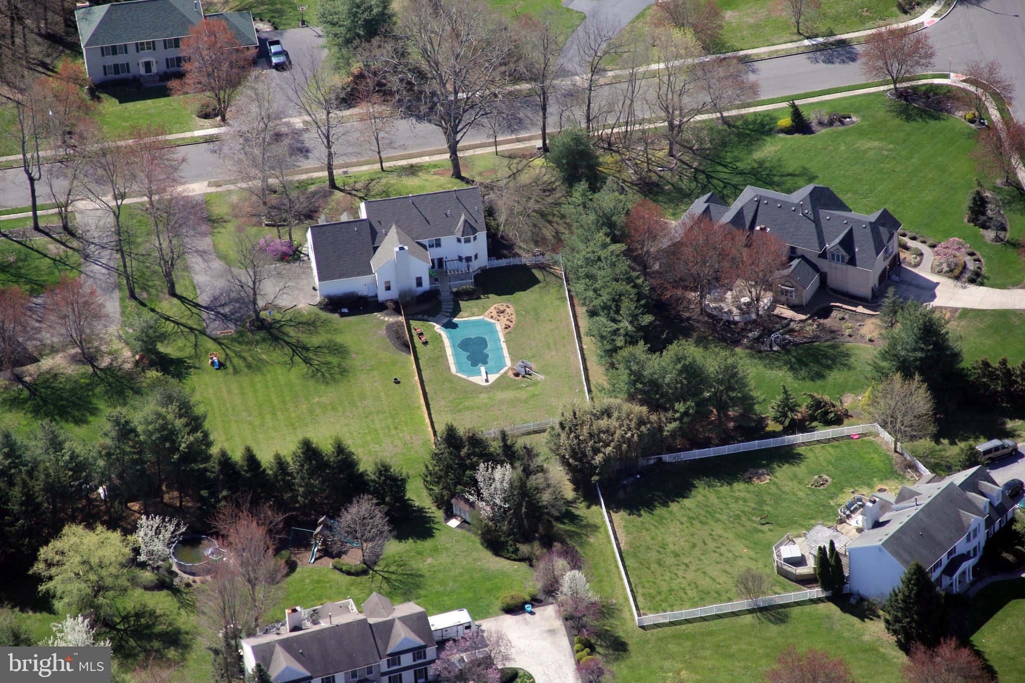 215 Yorkshire Terrace Wrightstown, NJ 08562 - Photo 4 of 43 an aerial view of a house with a garden and swimming pool