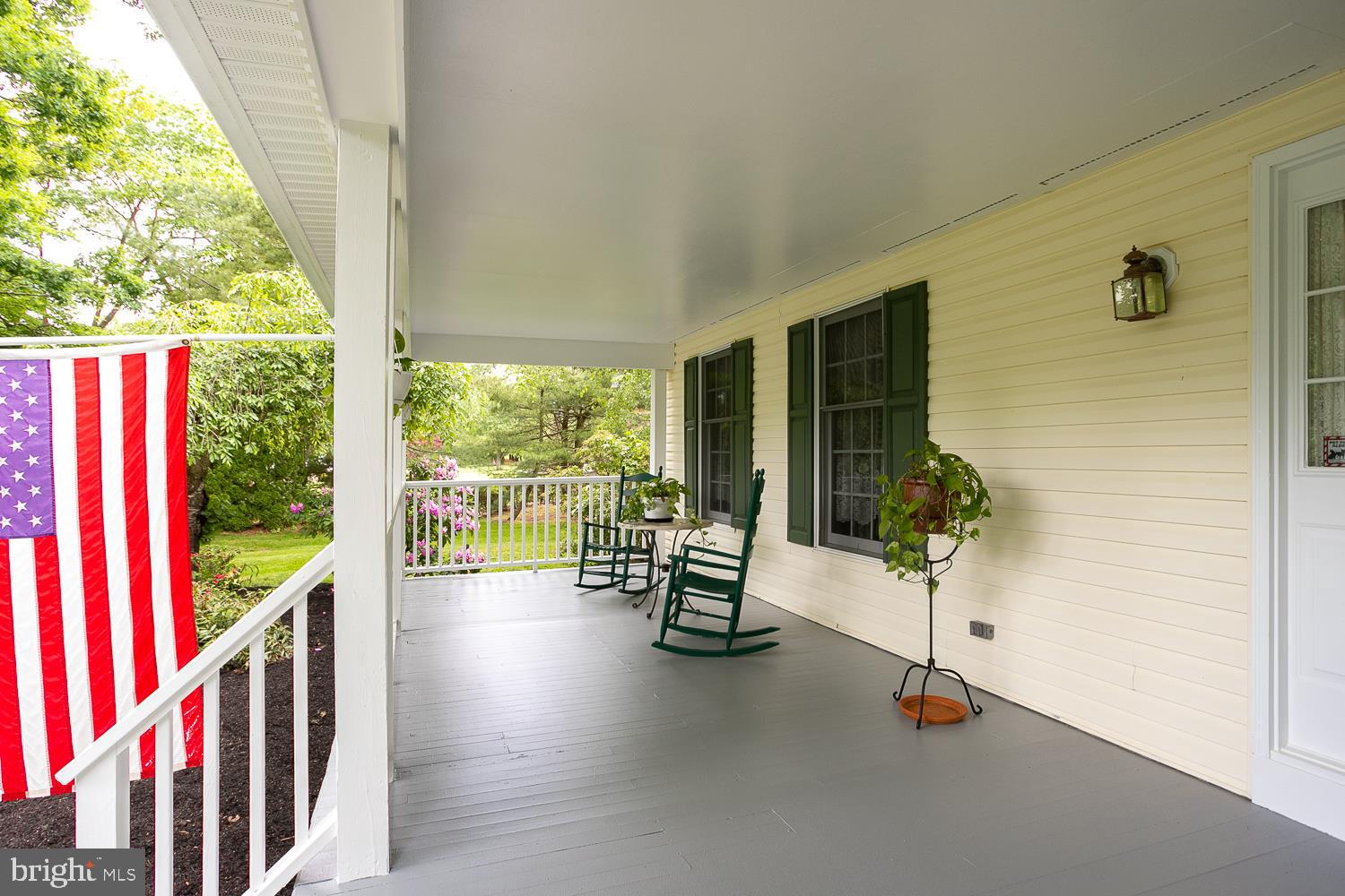 215 Yorkshire Terrace Wrightstown, NJ 08562 - Photo 7 of 43 a view of a porch with chairs and backyard