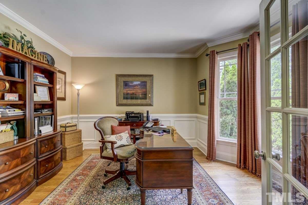 7207 Newport Avenue Raleigh, NC 27613 - Photo 2 of 25 a living room with furniture and a window
