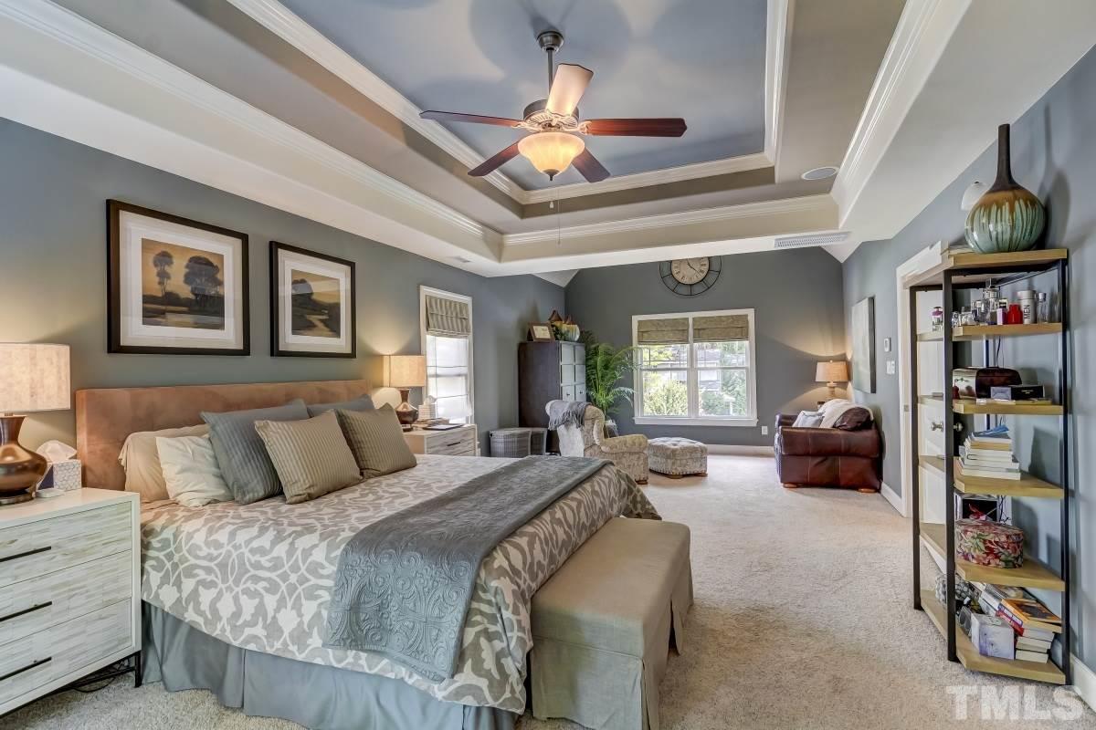 7207 Newport Avenue Raleigh, NC 27613 - Photo 13 of 25 a bedroom with bed and a window