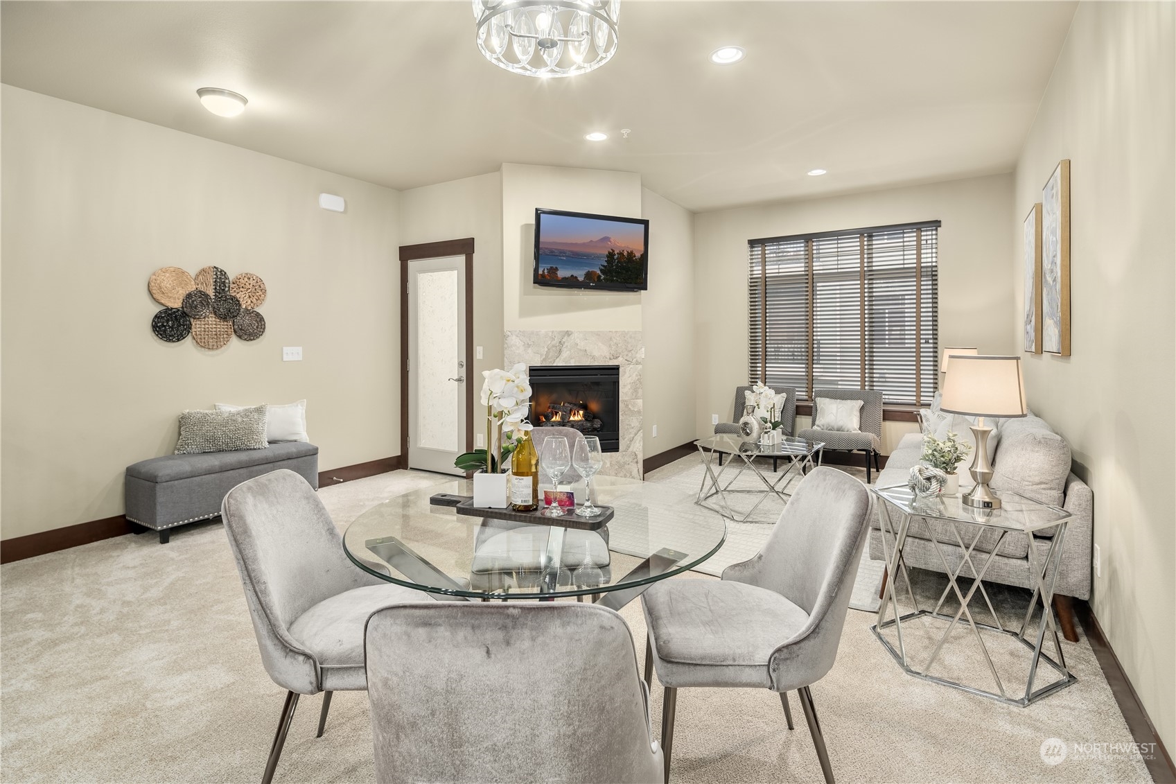 4008 Northeast 3rd Place Renton, WA 98056 - Photo 11 of 26 a living room with fireplace furniture and a flat screen tv