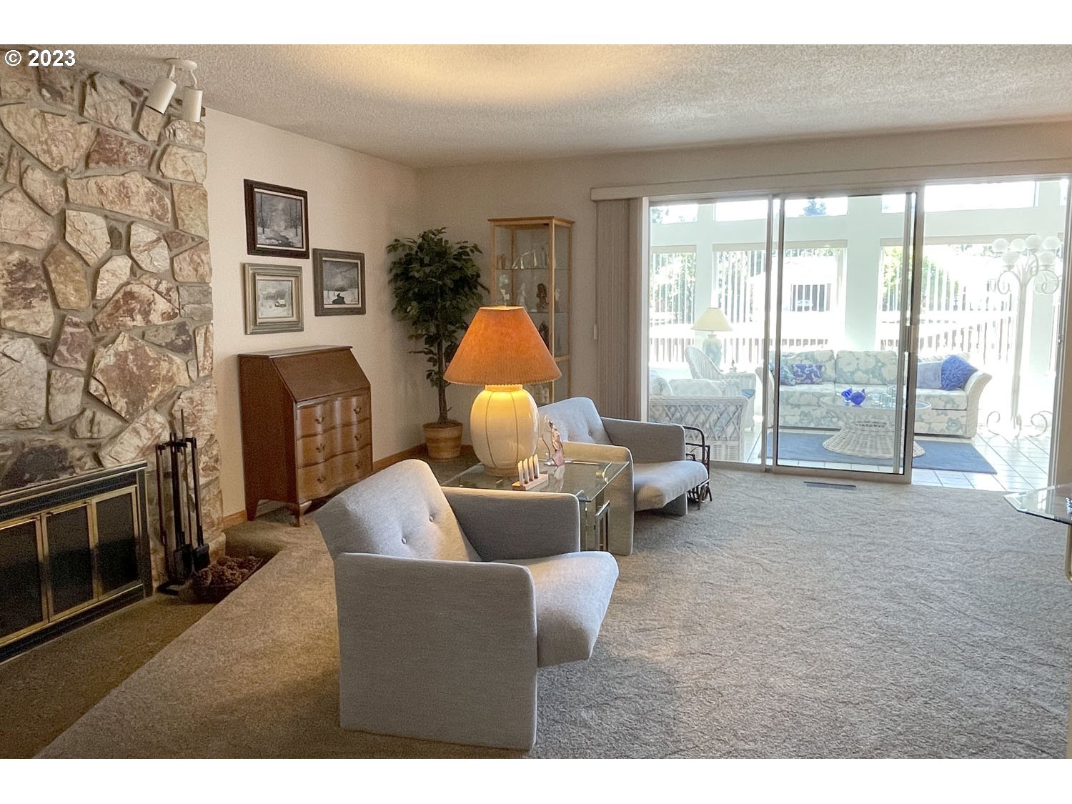 1155 Diamond Street Springfield, OR 97477 - Photo 4 of 34 a living room with furniture and a fireplace