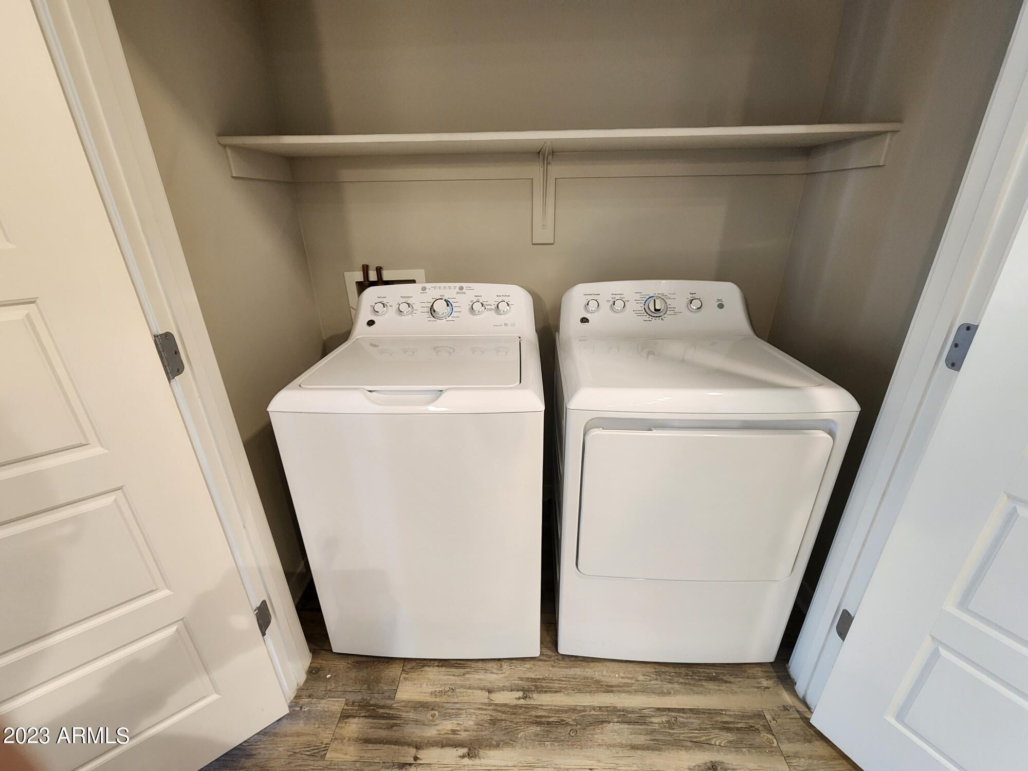 200 East Thomas Road, Unit B2 Phoenix, AZ 85012 - Photo 11 of 29 a utility room with dryer and washer