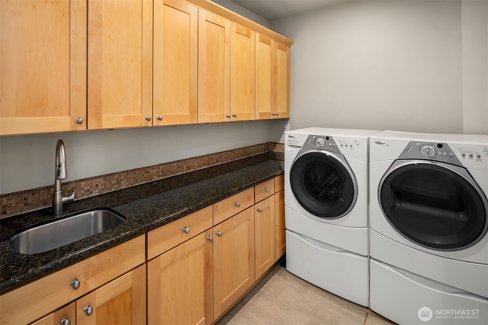 2 Crescent Key Bellevue, WA 98006 - Photo 33 of 38 a utility room with sink dryer and washer