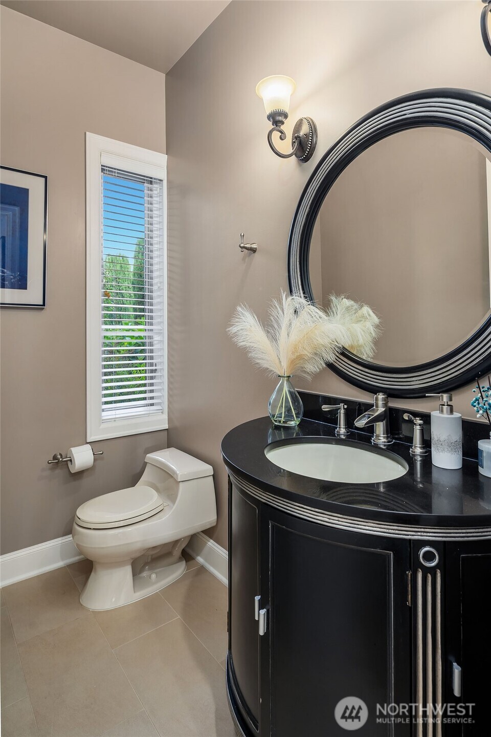 2 Crescent Key Bellevue, WA 98006 - Photo 34 of 38 a bathroom with a sink toilet and a mirror