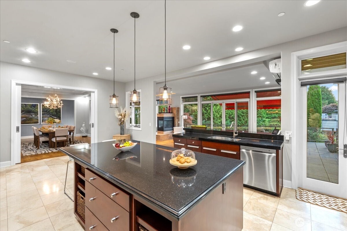 2 Crescent Key Bellevue, WA 98006 - Photo 9 of 38 a kitchen with a stove and a view of living room
