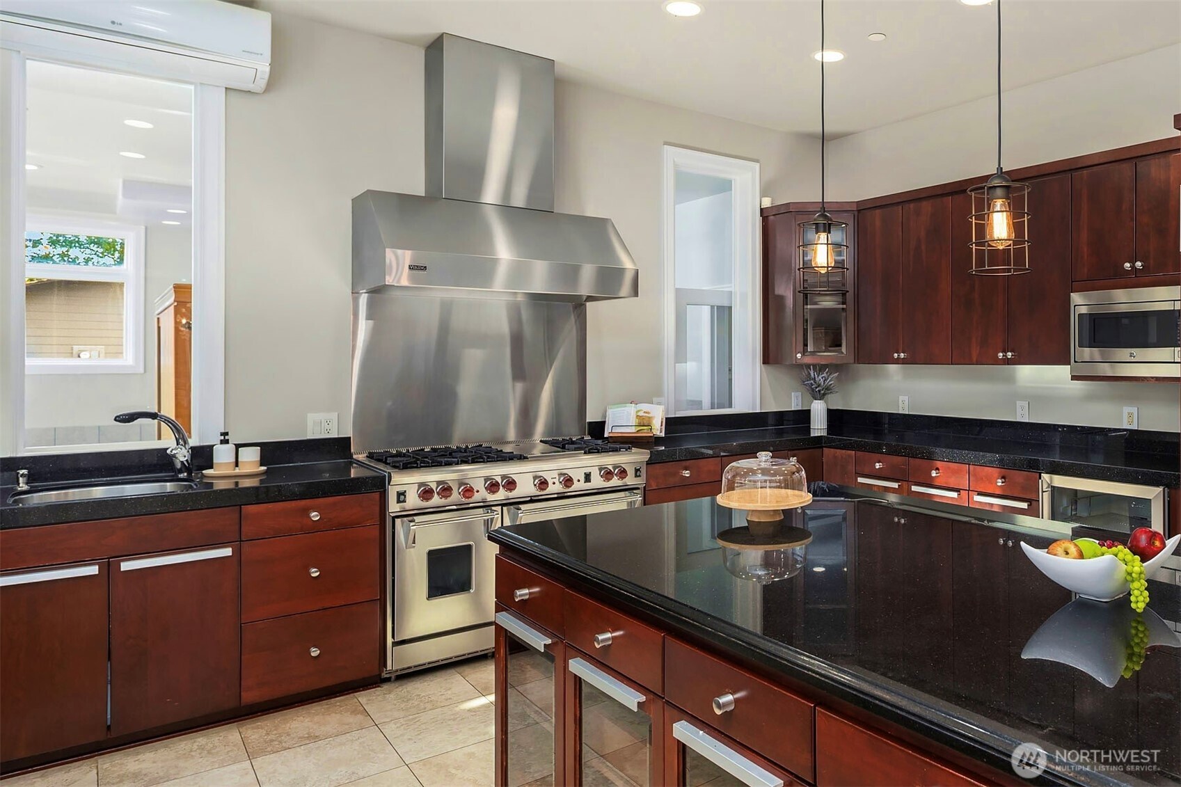 2 Crescent Key Bellevue, WA 98006 - Photo 10 of 38 a kitchen with stainless steel appliances granite countertop a sink a stove and a wooden floors