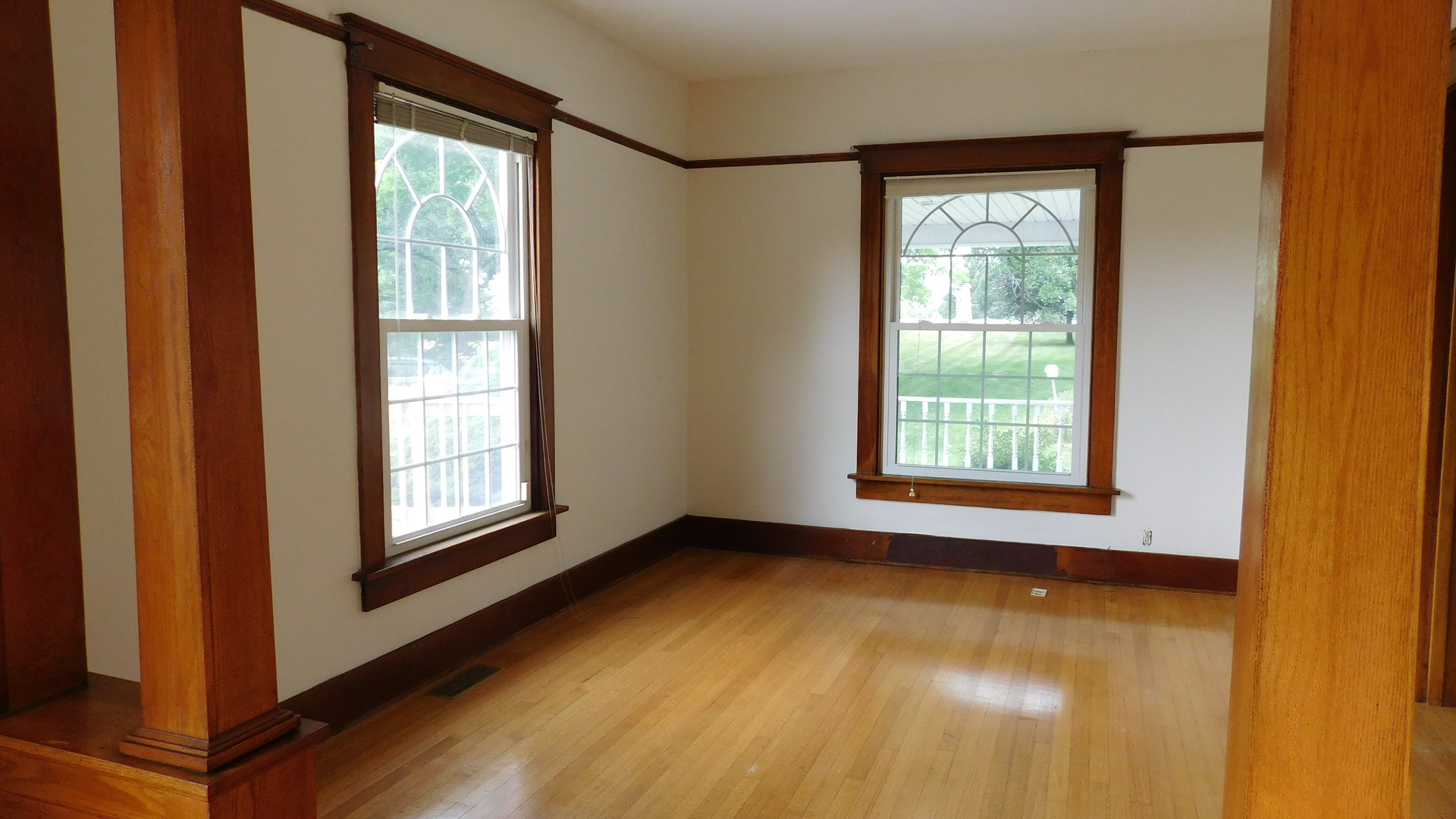 1232 B Steward Road Steward, IL 60553 - Photo 14 of 44 a view of an empty room with a window and wooden floor