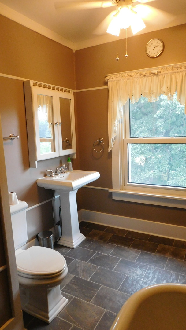 1232 B Steward Road Steward, IL 60553 - Photo 27 of 44 a bathroom with a toilet sink and mirror