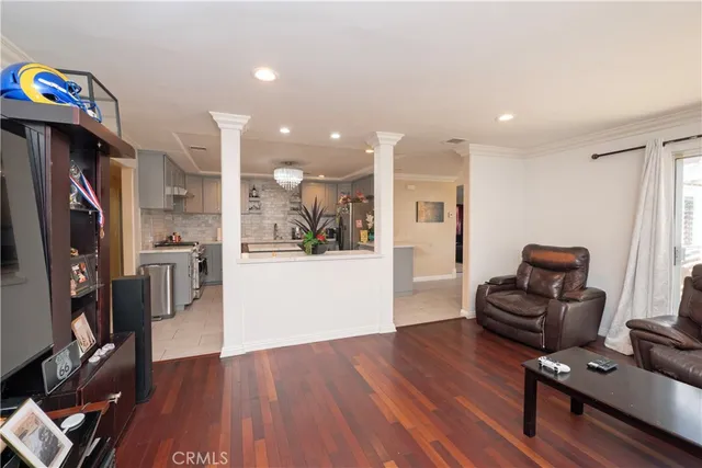 a kitchen with stove cabinets and refrigerator