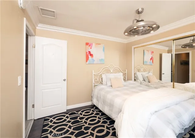 a white toilet sitting next to a shower