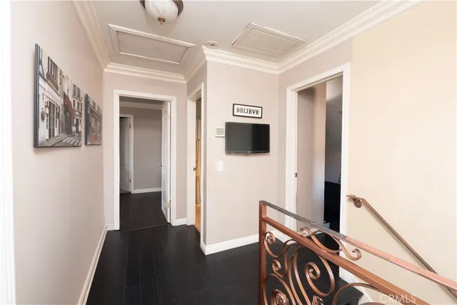 a bedroom with a bed and a mirror