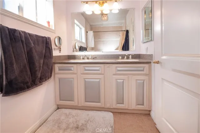 a view of balcony with wooden floor and seating space