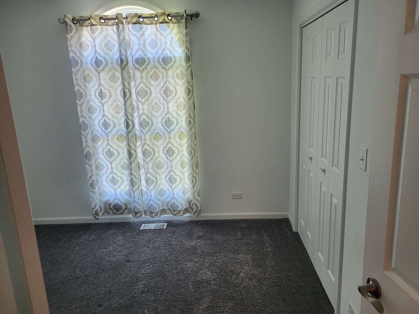 4509 Island Road Harvard, IL 60033 - Photo 19 of 40 a view of room with window and carpet