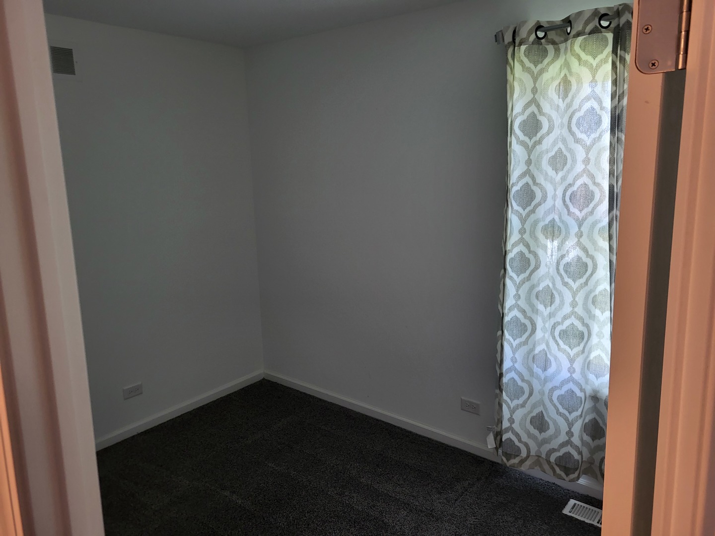 4509 Island Road Harvard, IL 60033 - Photo 20 of 40 a small room with a window