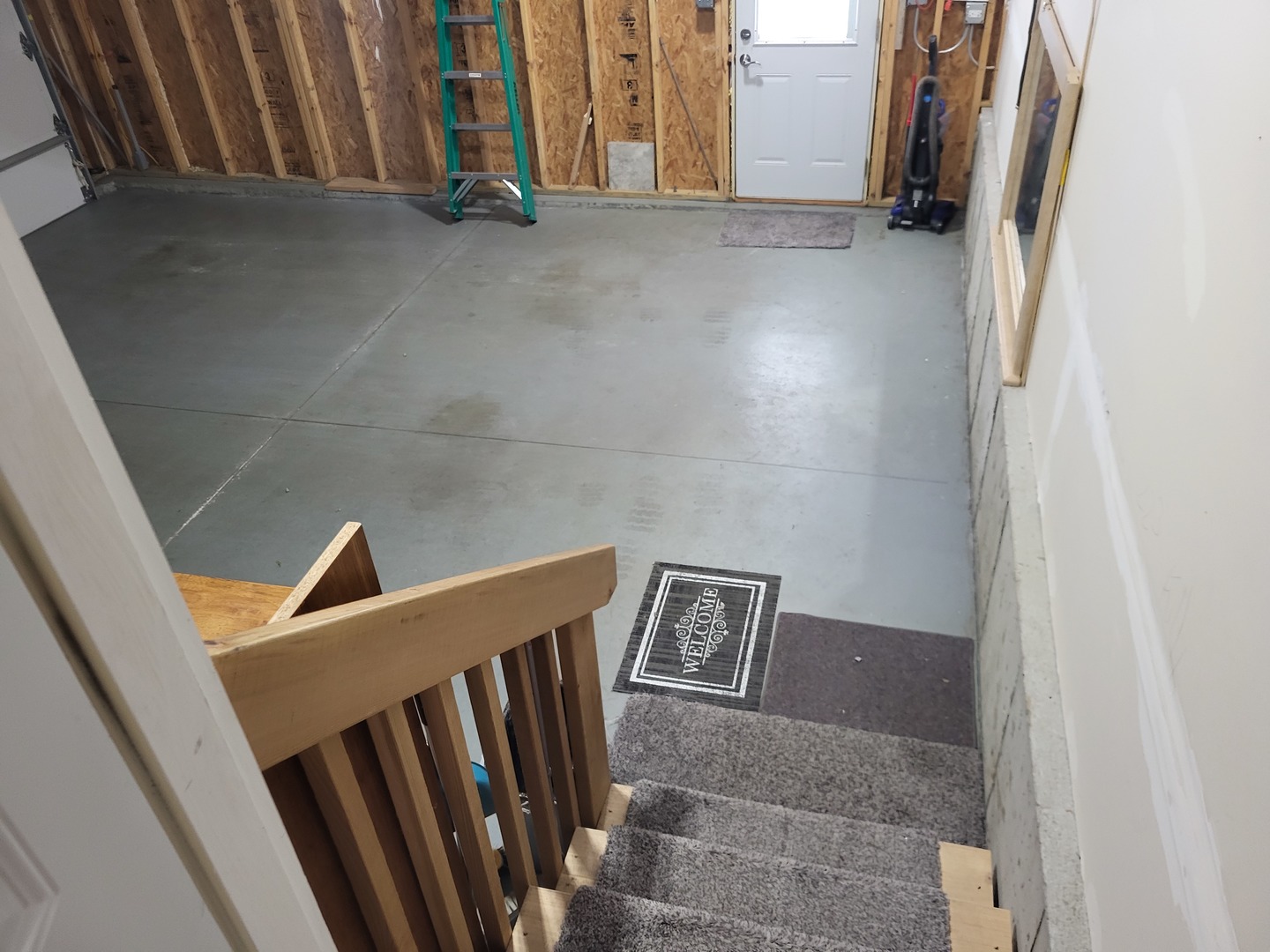 4509 Island Road Harvard, IL 60033 - Photo 29 of 40 a view of stairs and an empty room with wooden floor