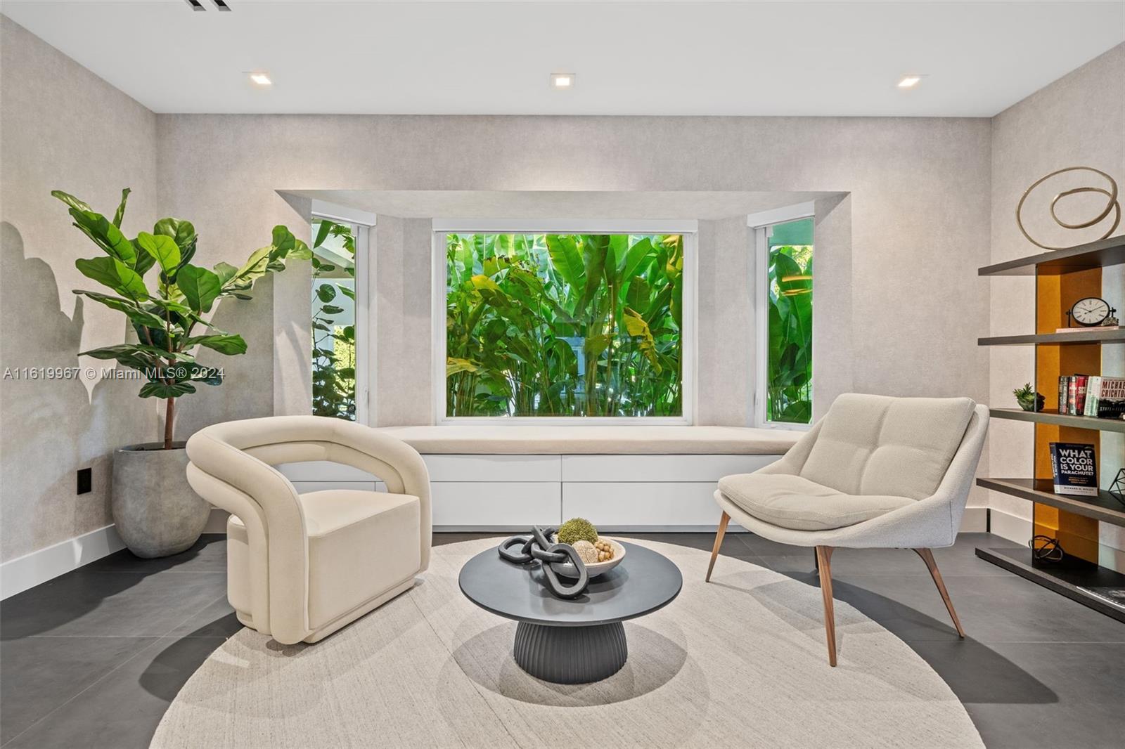 4800 Bay Point Road Miami, FL 33137 - Photo 23 of 74 a living room with furniture and a potted plant