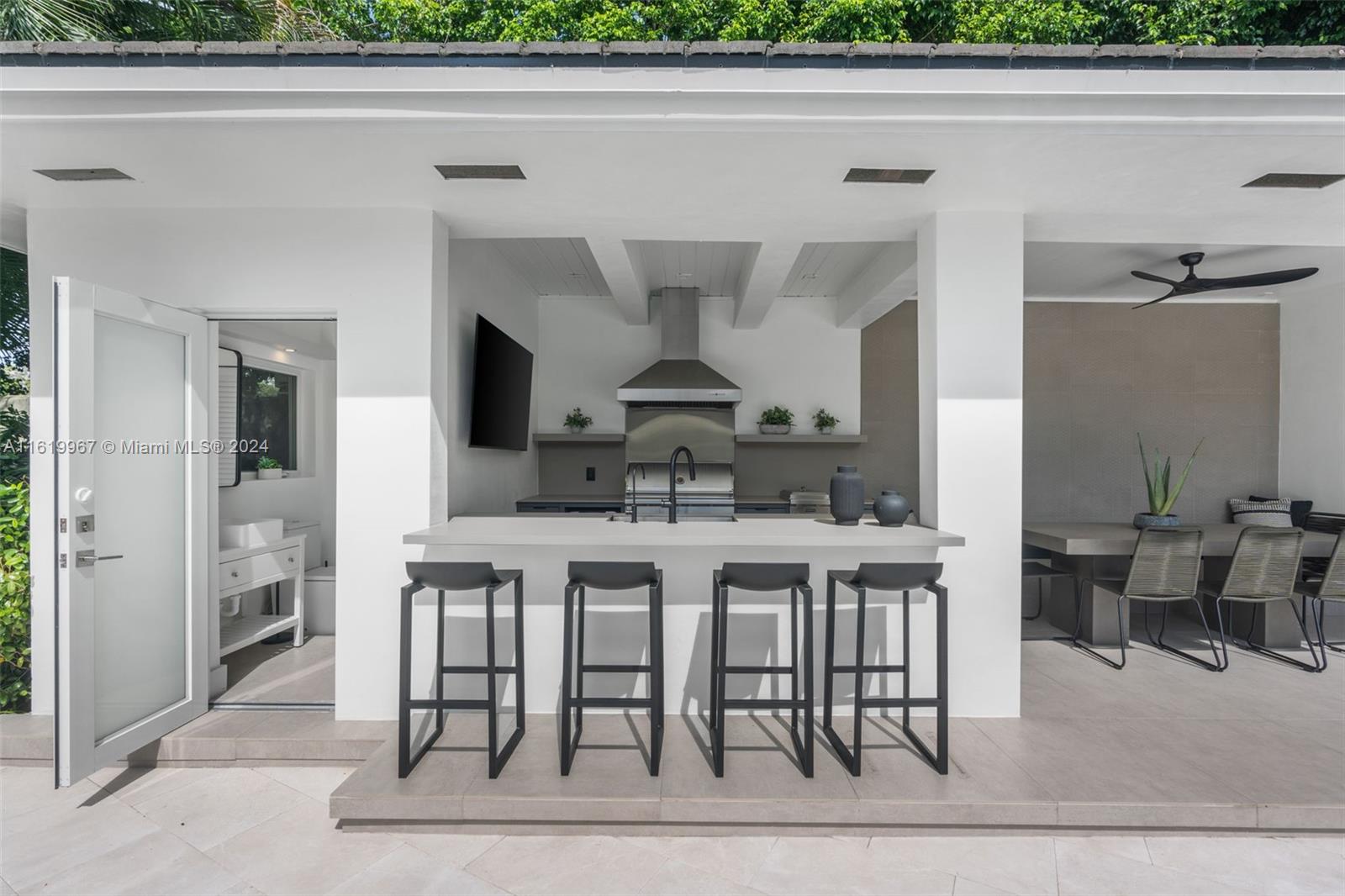 4800 Bay Point Road Miami, FL 33137 - Photo 48 of 74 a view of a dining room with furniture
