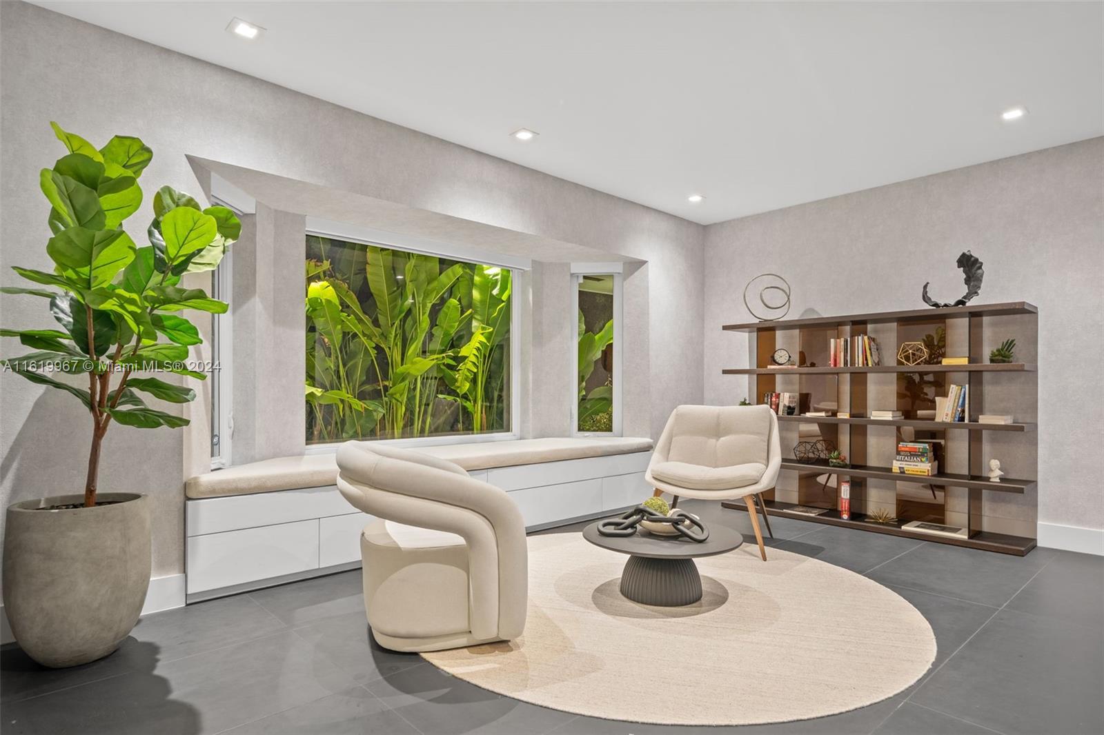 4800 Bay Point Road Miami, FL 33137 - Photo 67 of 74 a living room with furniture and a large window
