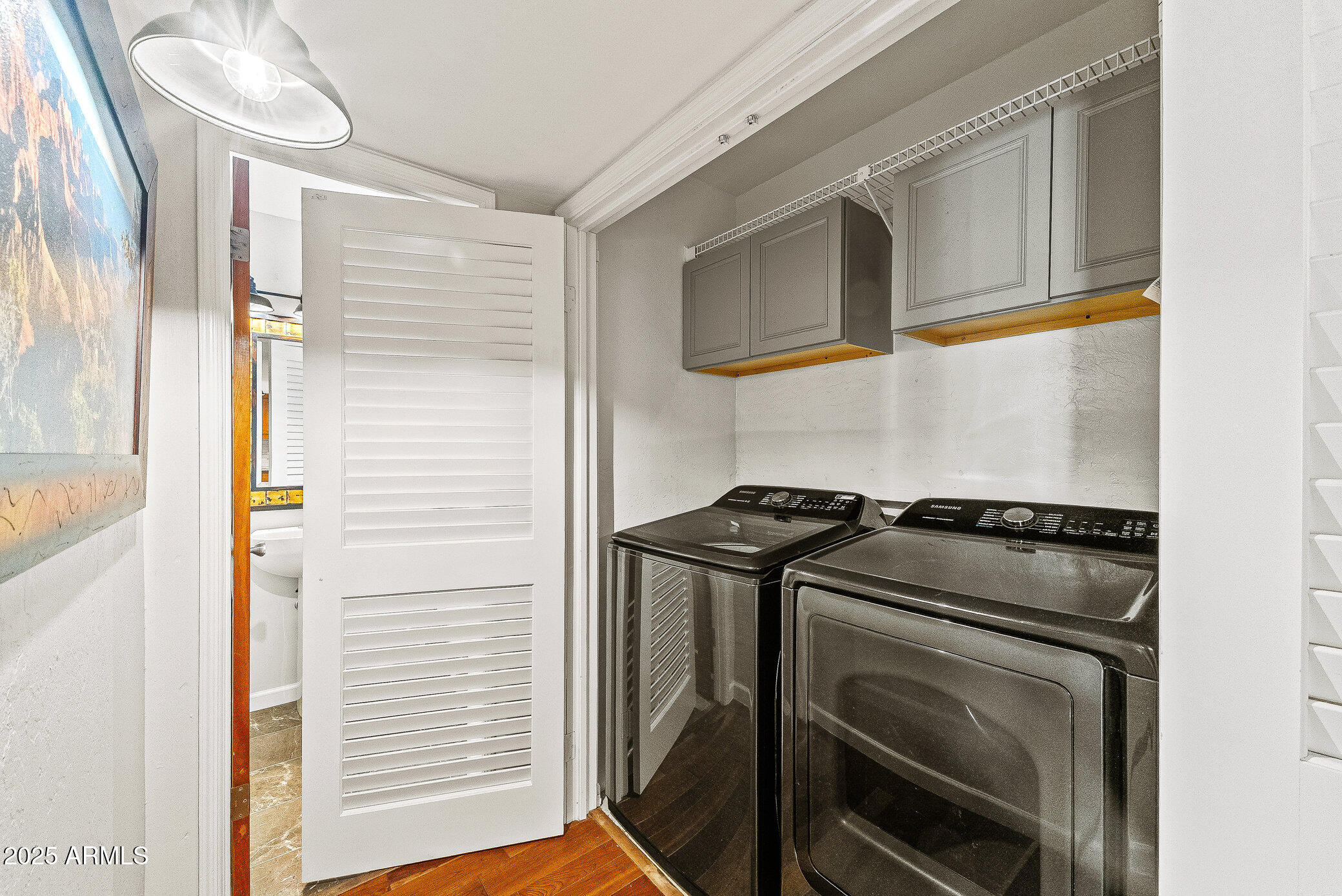 6159 East Indian School Road, Unit 104 Scottsdale, AZ 85251 - Photo 13 of 24 a close view of a stove and a microwave