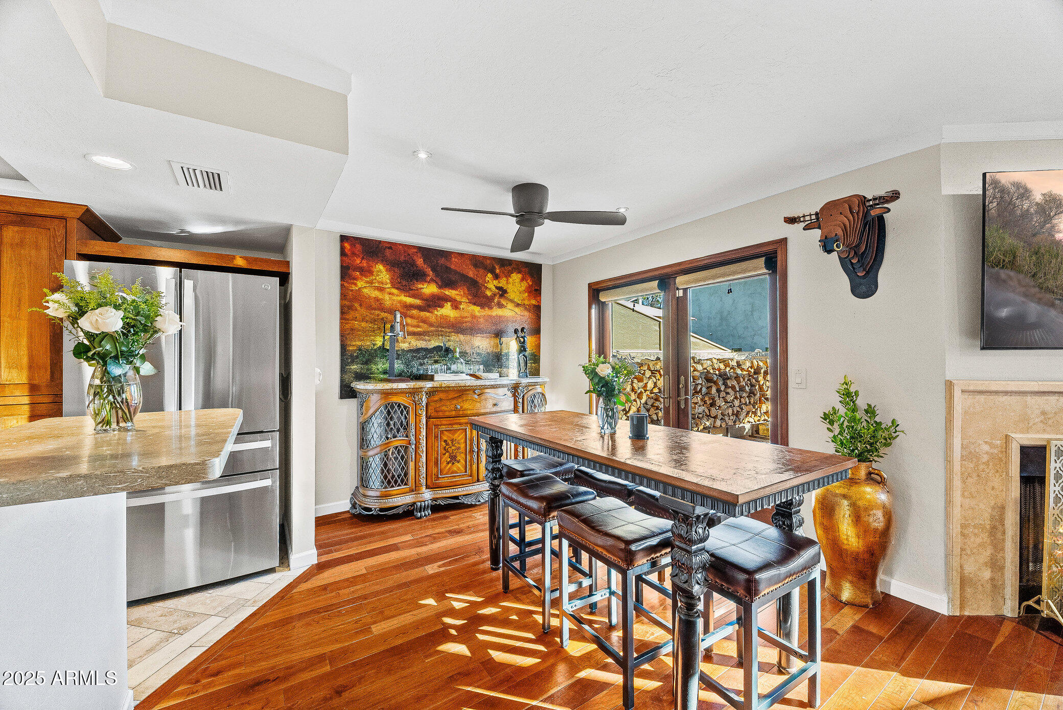 6159 East Indian School Road, Unit 104 Scottsdale, AZ 85251 - Photo 3 of 24 a dining room with furniture and a floor to ceiling window