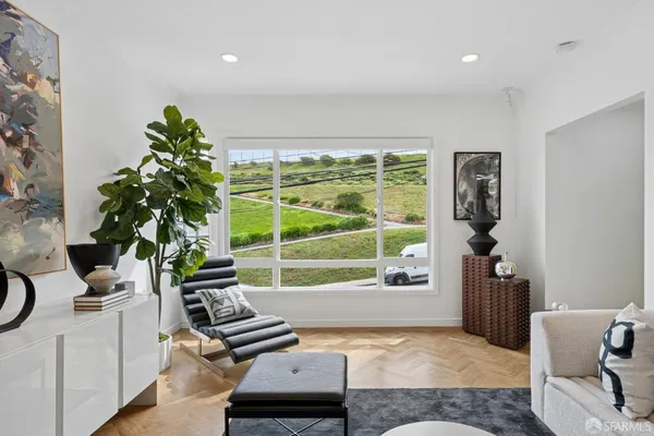a kitchen with a table and chairs in it