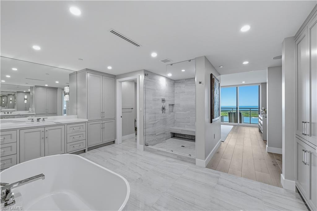 13935 Old Coast Road, Unit 1604 Naples, FL 34110 - Photo 16 of 39 Owner's Bath w Soaking Tub and Walk in Shower and Dual Vanities