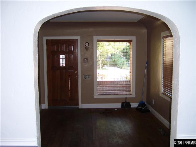 115 La Rue Avenue Reno, NV 89509 - Photo 3 of 12 a front view of a house with a yard