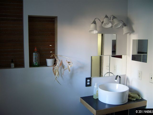 115 La Rue Avenue Reno, NV 89509 - Photo 10 of 12 a bathroom with a sink and a mirror