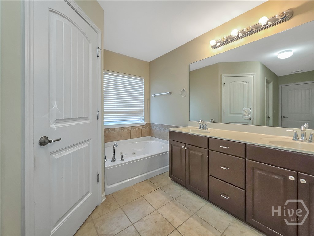 4 Melody Drive Pooler, GA 31322 - Photo 29 of 52 Primary Bathroom double sinks and whirlpool tub view