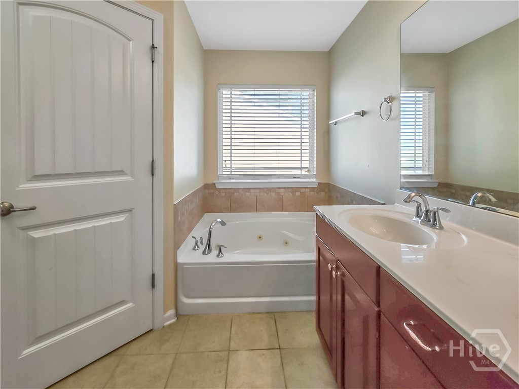 4 Melody Drive Pooler, GA 31322 - Photo 30 of 52 Primary Bathroom double sinks and whirlpool tub view 2