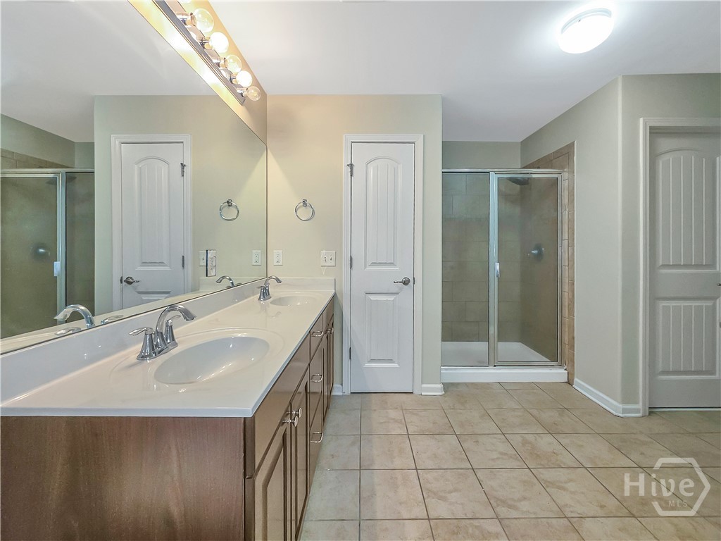 4 Melody Drive Pooler, GA 31322 - Photo 32 of 52 Primary Bathroom with double sinks and a tiled Walk-in shower