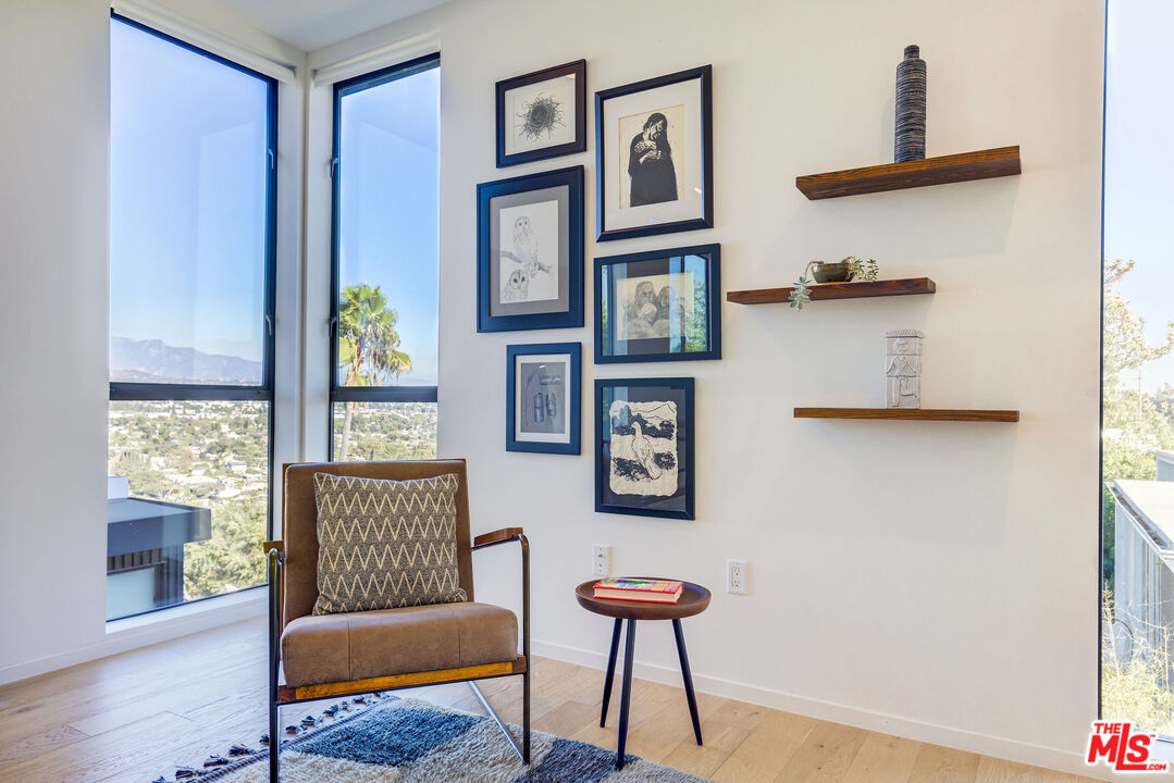 2902 Hemingway Drive Los Angeles, CA 90039 - Photo 20 of 25 a living room with furniture and a window