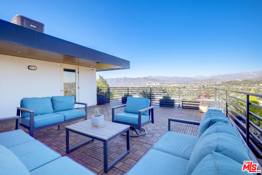 2902 Hemingway Drive Los Angeles, CA 90039 - Photo 2 of 25 a view of a terrace with couches and lounge chairs