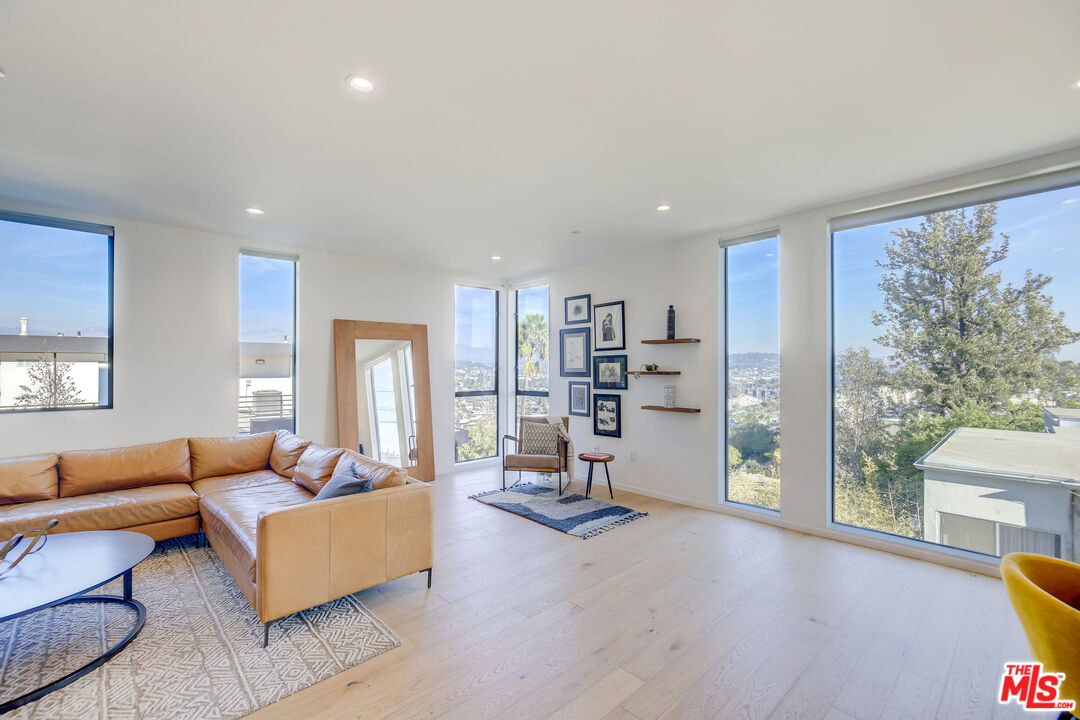 2902 Hemingway Drive Los Angeles, CA 90039 - Photo 21 of 25 a living room with furniture and a large window