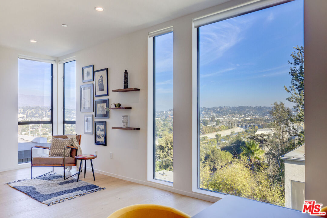 2902 Hemingway Drive Los Angeles, CA 90039 - Photo 4 of 25 a living room with furniture and a large window