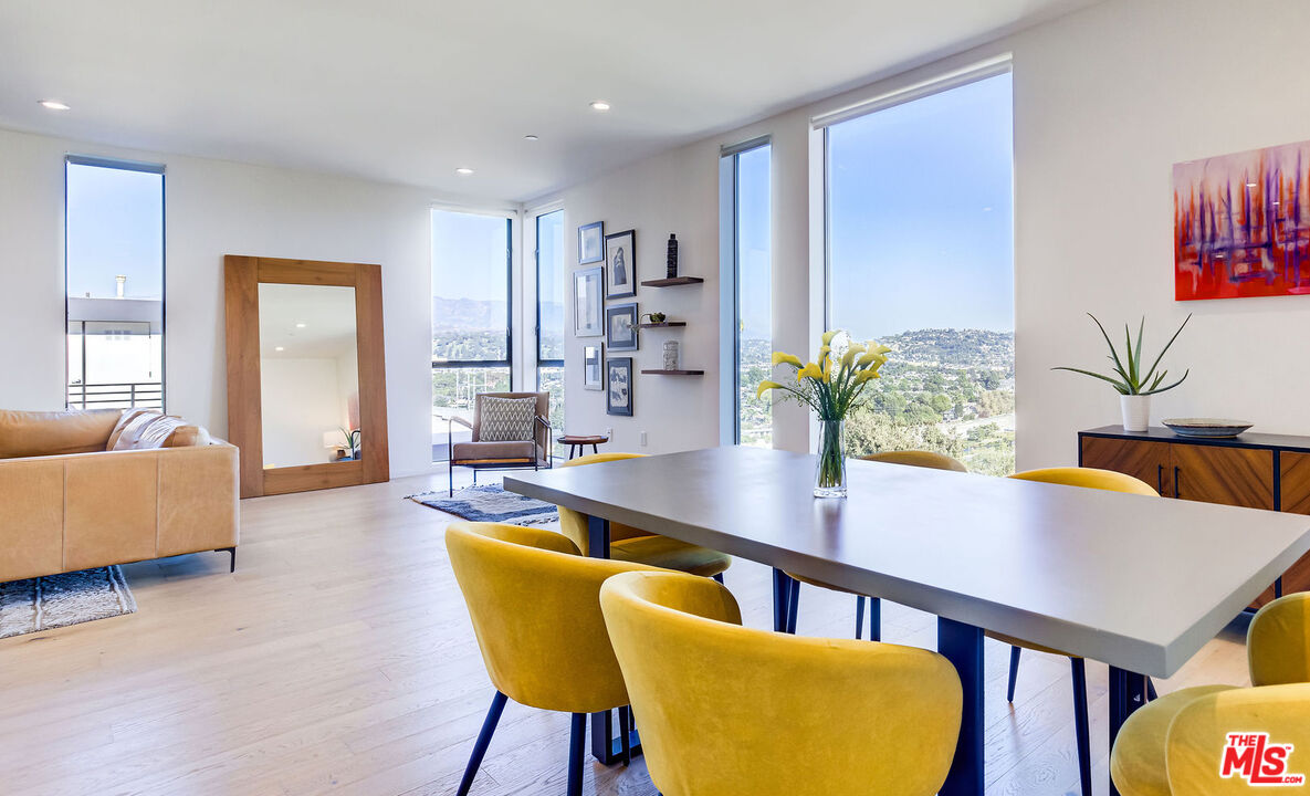 2902 Hemingway Drive Los Angeles, CA 90039 - Photo 6 of 25 a view of a dining room with furniture and wooden floor