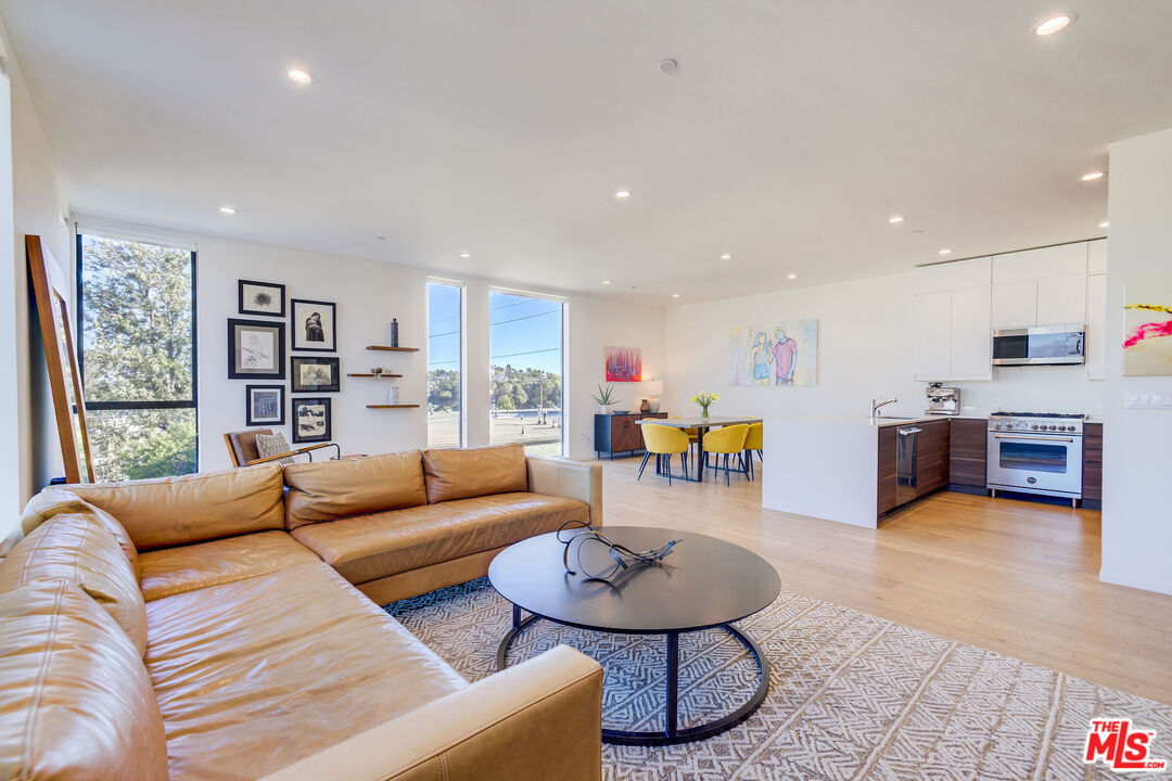 2902 Hemingway Drive Los Angeles, CA 90039 - Photo 7 of 25 a living room with furniture and a wooden floor