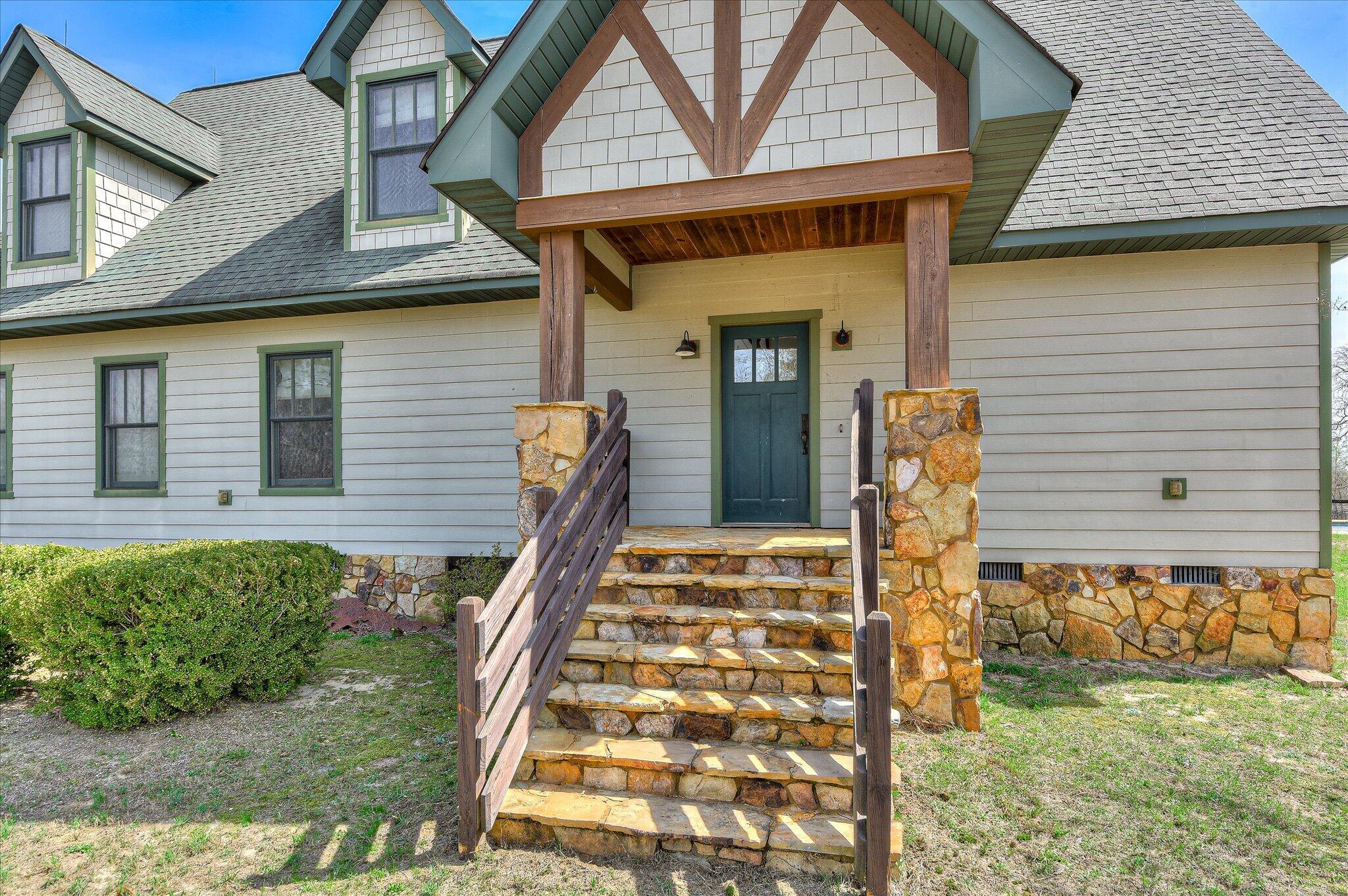 1063 Colbert Bridge Road Aiken, SC 29803 - Photo 6 of 68 a front view of a house with garden